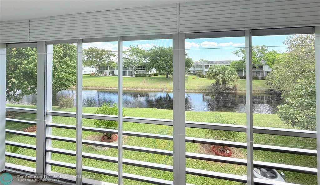 15 Markham A, Unit 15 Deerfield Beach, FL 33442 - Photo 33 of 45 a view of outdoor space with backyard