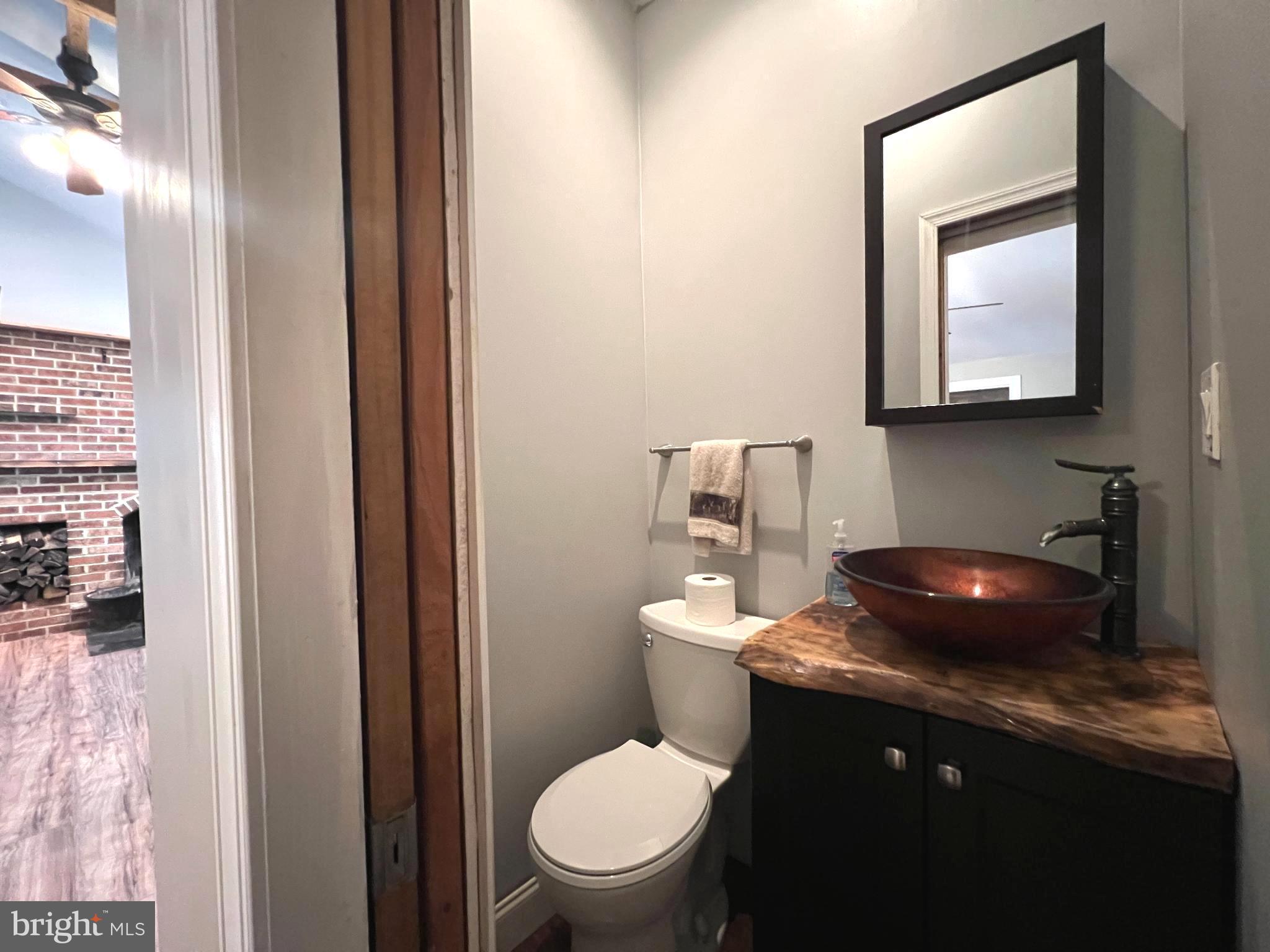 30 Duane Road Doylestown, PA 18901 - Photo 8 of 26 a bathroom with a toilet a sink and mirror