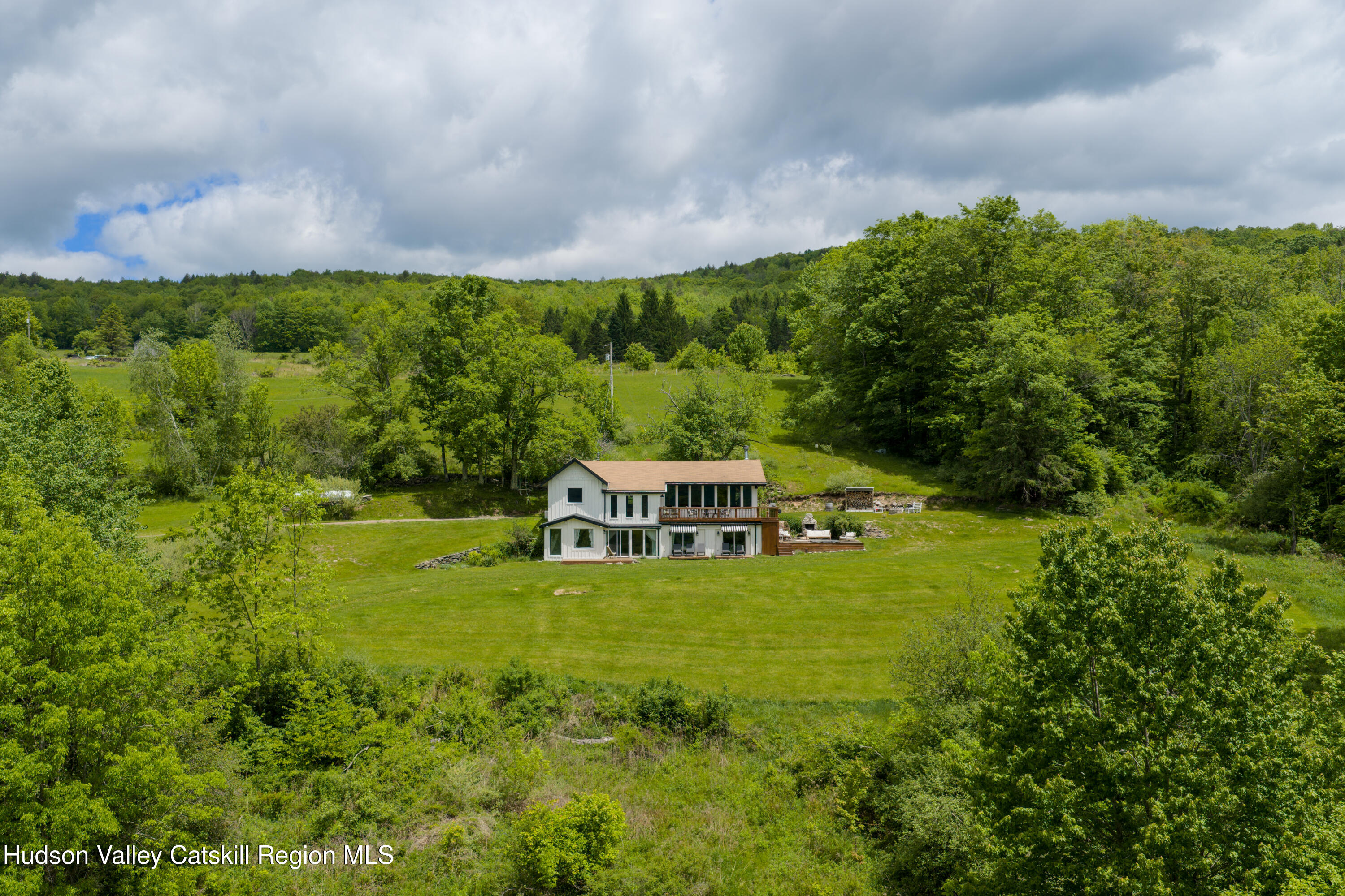 822 Burton Hall Road Margaretville, NY 12455 - Photo 1 of 32 a house view with a garden space