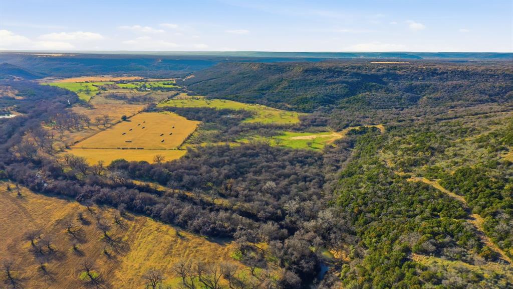 200 Patterson Lane Palo Pinto, TX 76484 - Photo 13 of 24 a view of swimming pool from a lake