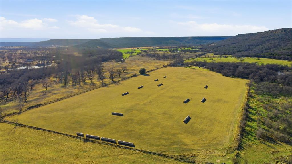 200 Patterson Lane Palo Pinto, TX 76484 - Photo 16 of 24 a view of a swimming pool with an ocean view
