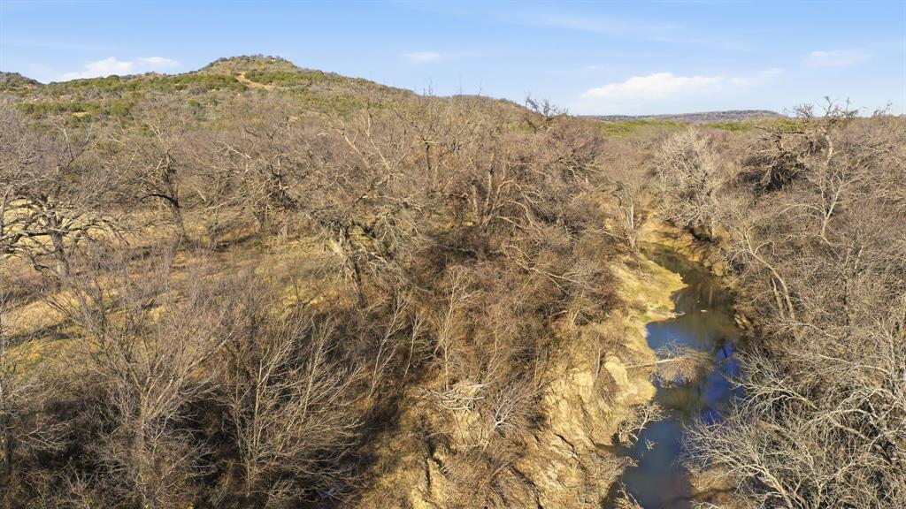 200 Patterson Lane Palo Pinto, TX 76484 - Photo 7 of 24 a view of a large mountain with mountains in the background