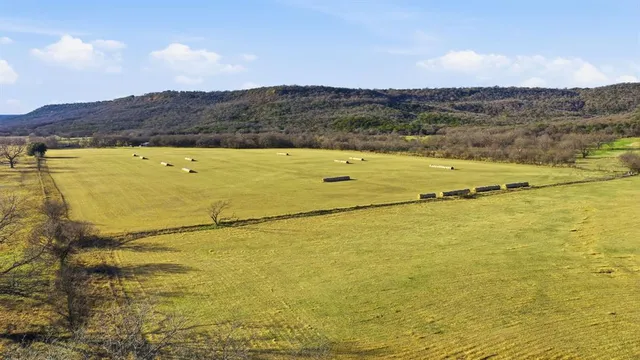 a view of an ocean and mountain