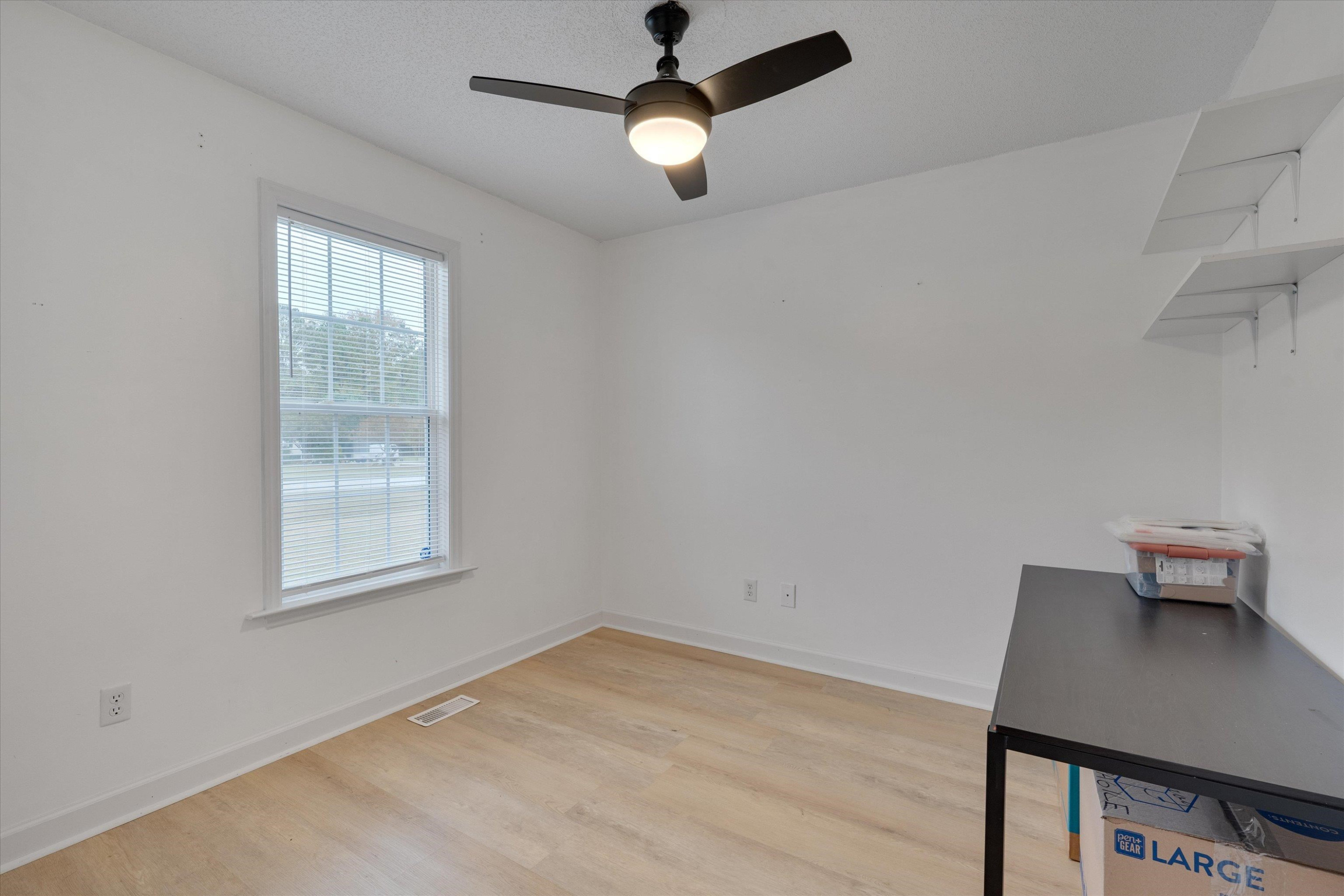 2568 Matthews Road Clayton, NC 27520 - Photo 19 of 26 a view of an empty room with a window