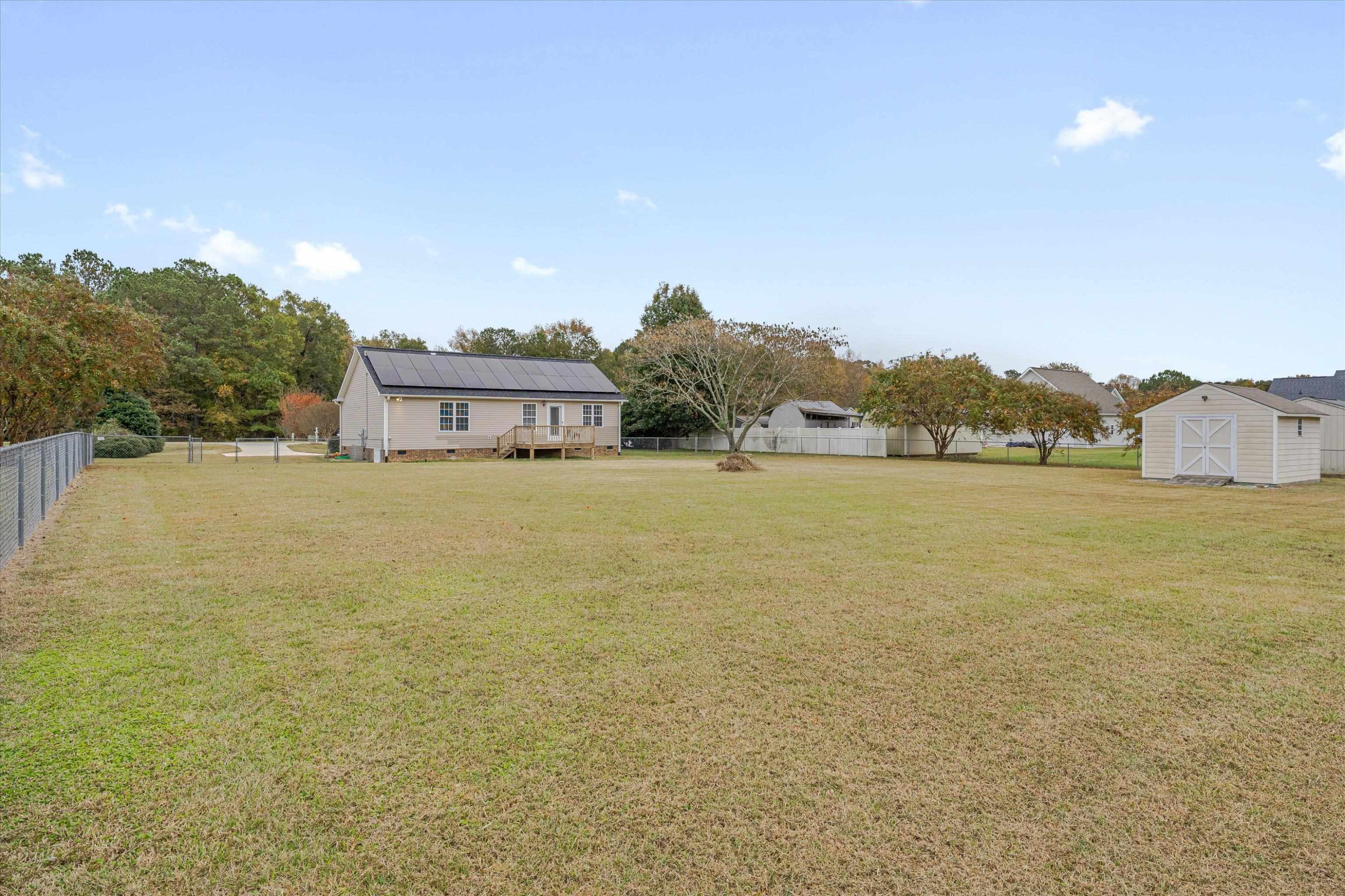 2568 Matthews Road Clayton, NC 27520 - Photo 4 of 26 a view of a lake with a city
