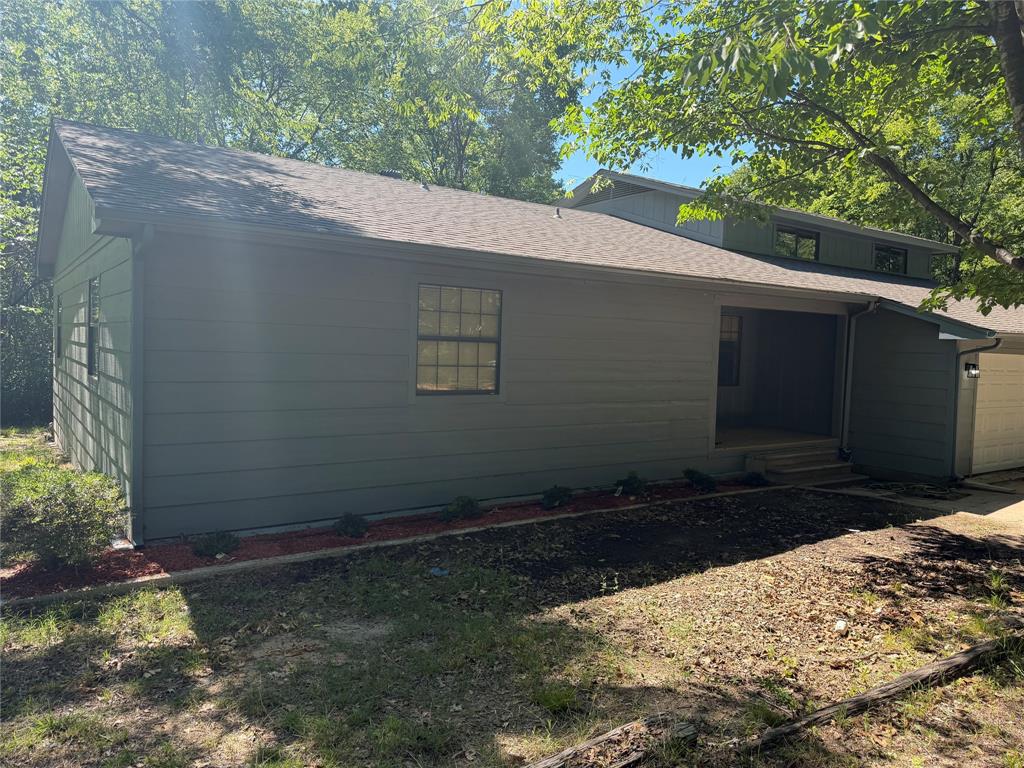 257 West Acres Road Gun Barrel City, TX 75156 - Photo 2 of 22 a backyard of a house