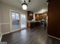 a view of a kitchen and dining room