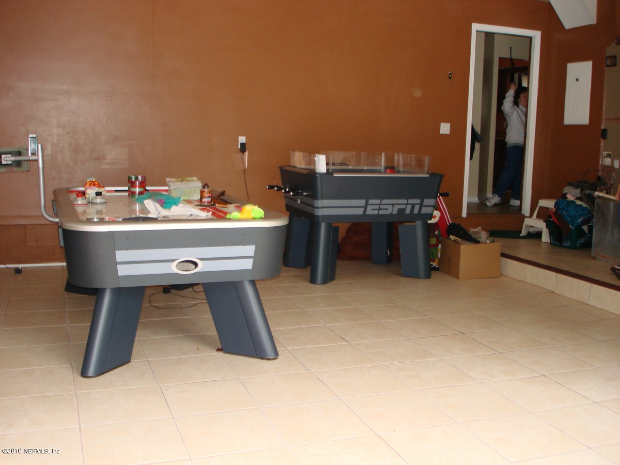 4377 Banks Road Middleburg, FL 32068 - Photo 14 of 55 Large Garage tiled floor room to play
