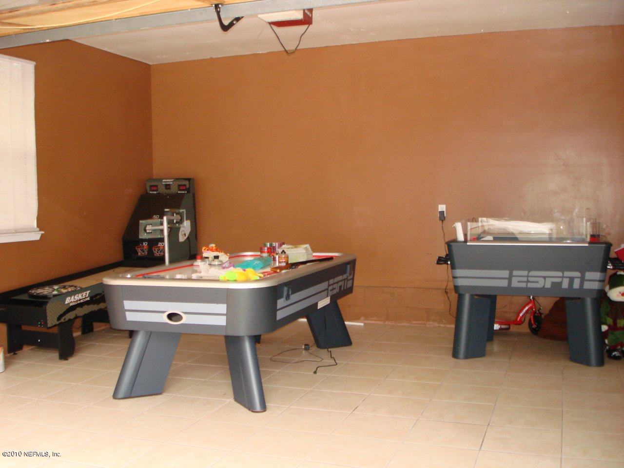 4377 Banks Road Middleburg, FL 32068 - Photo 15 of 55 Large Garage tiled floor room to play2