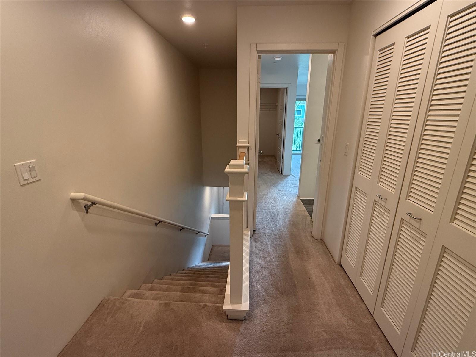 91-3524 Iwikuamo'o Street, Unit 102 Ewa Beach, HI 96706 - Photo 12 of 25 a view of entryway with wooden floor
