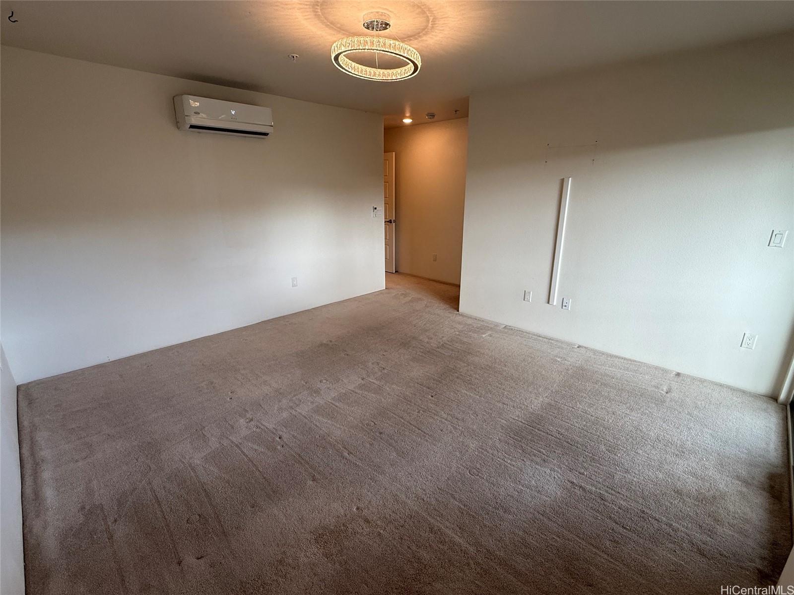 91-3524 Iwikuamo'o Street, Unit 102 Ewa Beach, HI 96706 - Photo 15 of 25 a view of an empty room