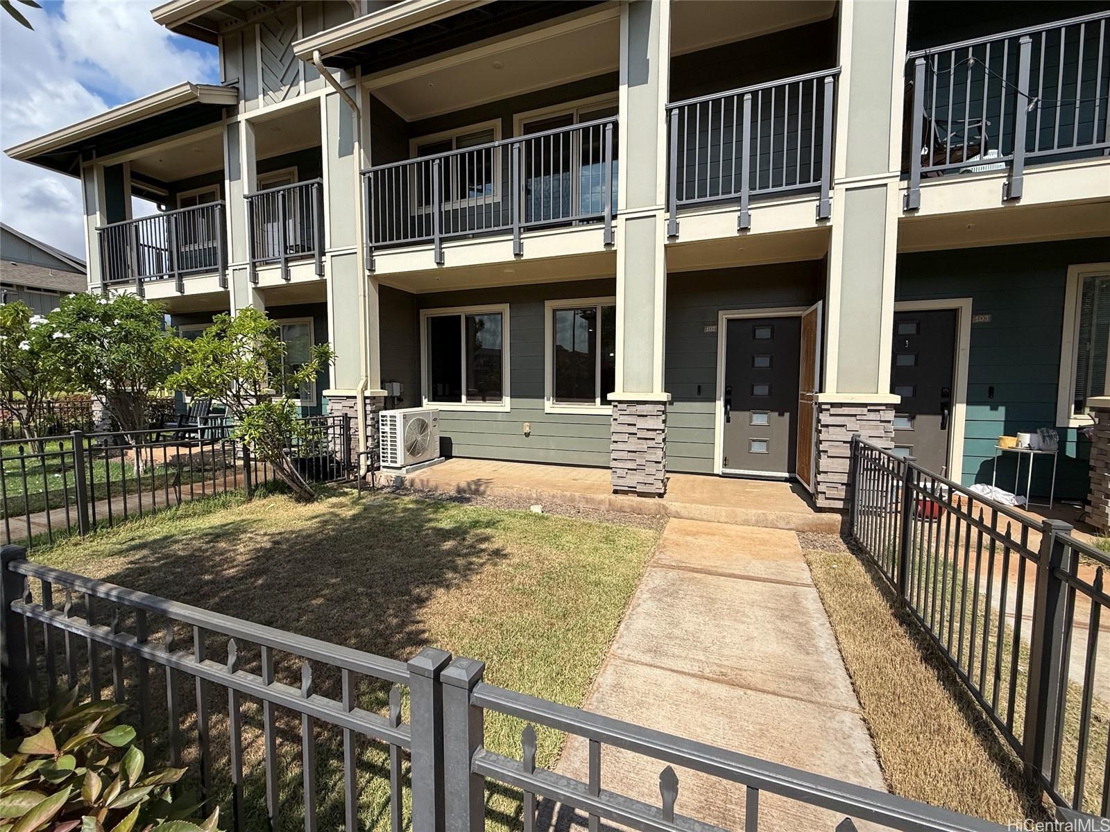 91-3524 Iwikuamo'o Street, Unit 102 Ewa Beach, HI 96706 - Photo 3 of 25 a view of a house with sitting area
