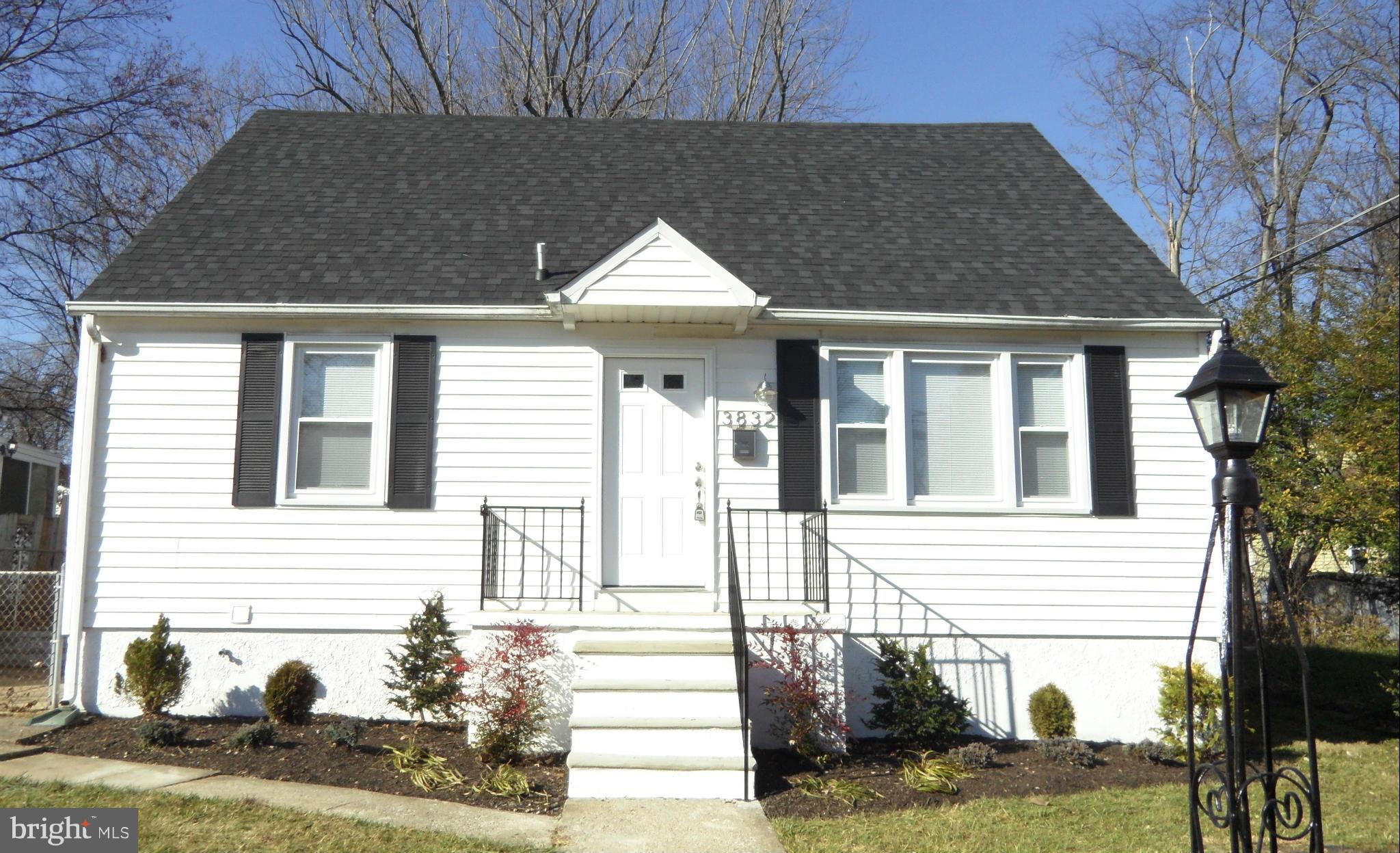 3832 Byfield Road Baltimore, MD 21207 - Photo 2 of 30 a front view of a house with a yard