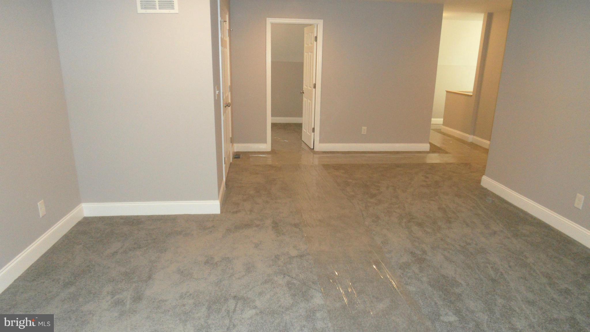 3832 Byfield Road Baltimore, MD 21207 - Photo 14 of 30 a view of an empty room