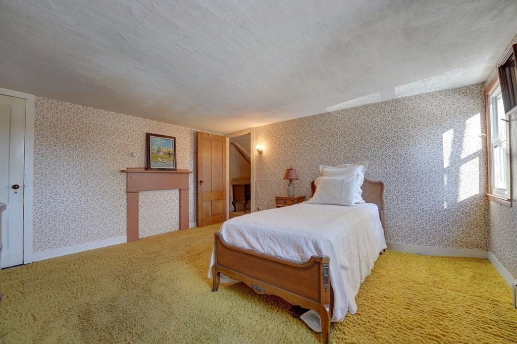 54 Lafayette Road Salisbury, MA 01952 - Photo 24 of 30 a bedroom with a bed and window