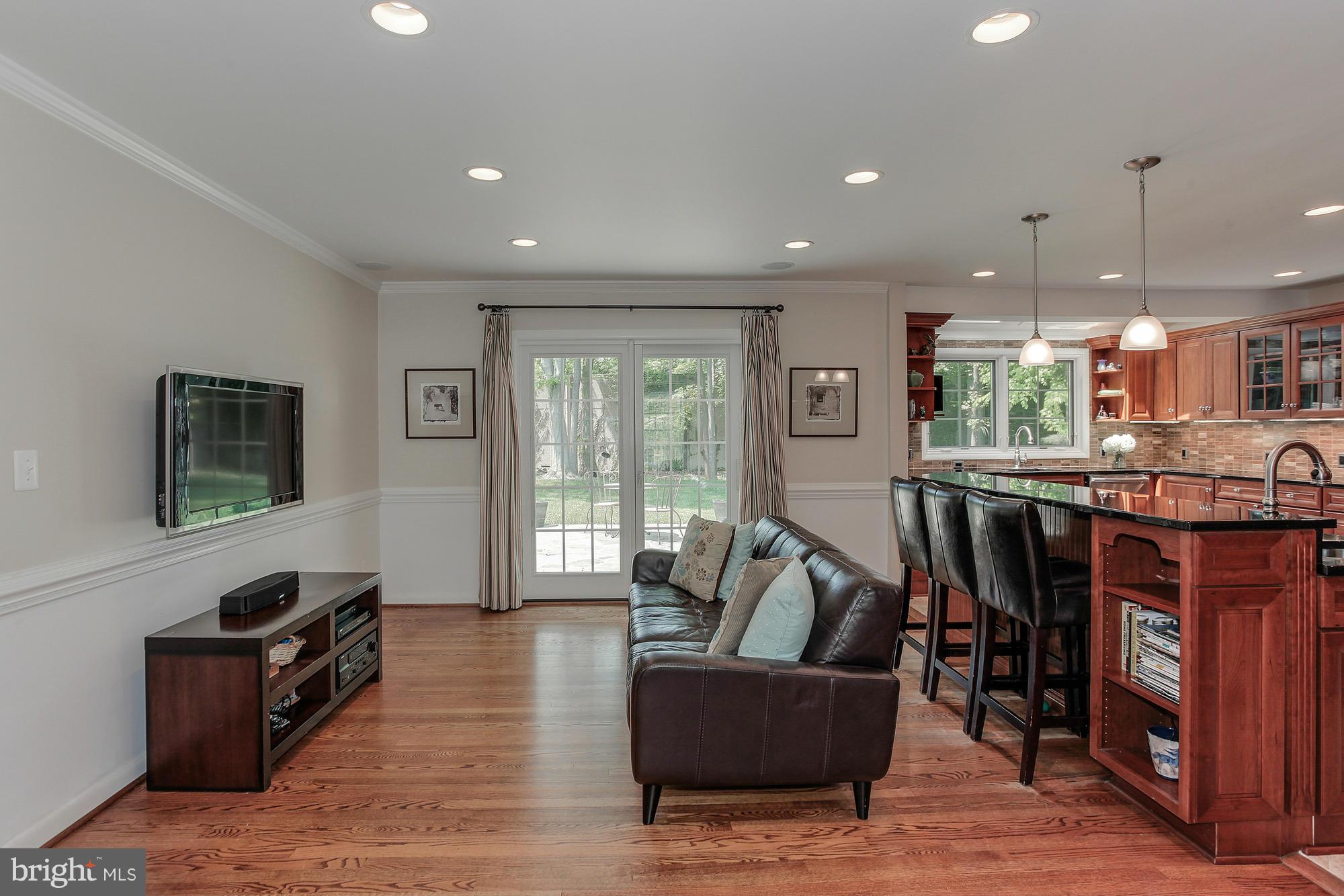 7413 Arrowood Road Bethesda, MD 20817 - Photo 6 of 30 Family Room with Glass Door Passage to Rear