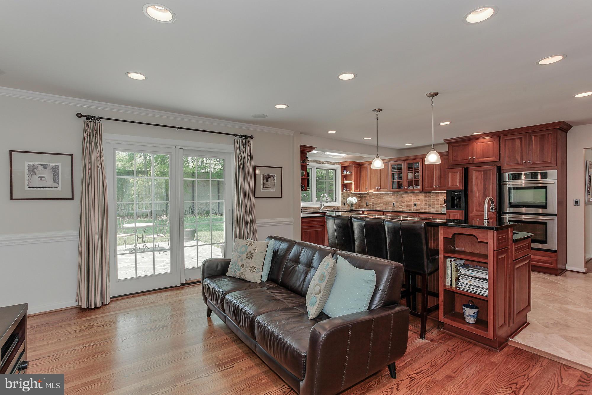 7413 Arrowood Road Bethesda, MD 20817 - Photo 7 of 30 Family Room is Open to Gorgeous Kitchen
