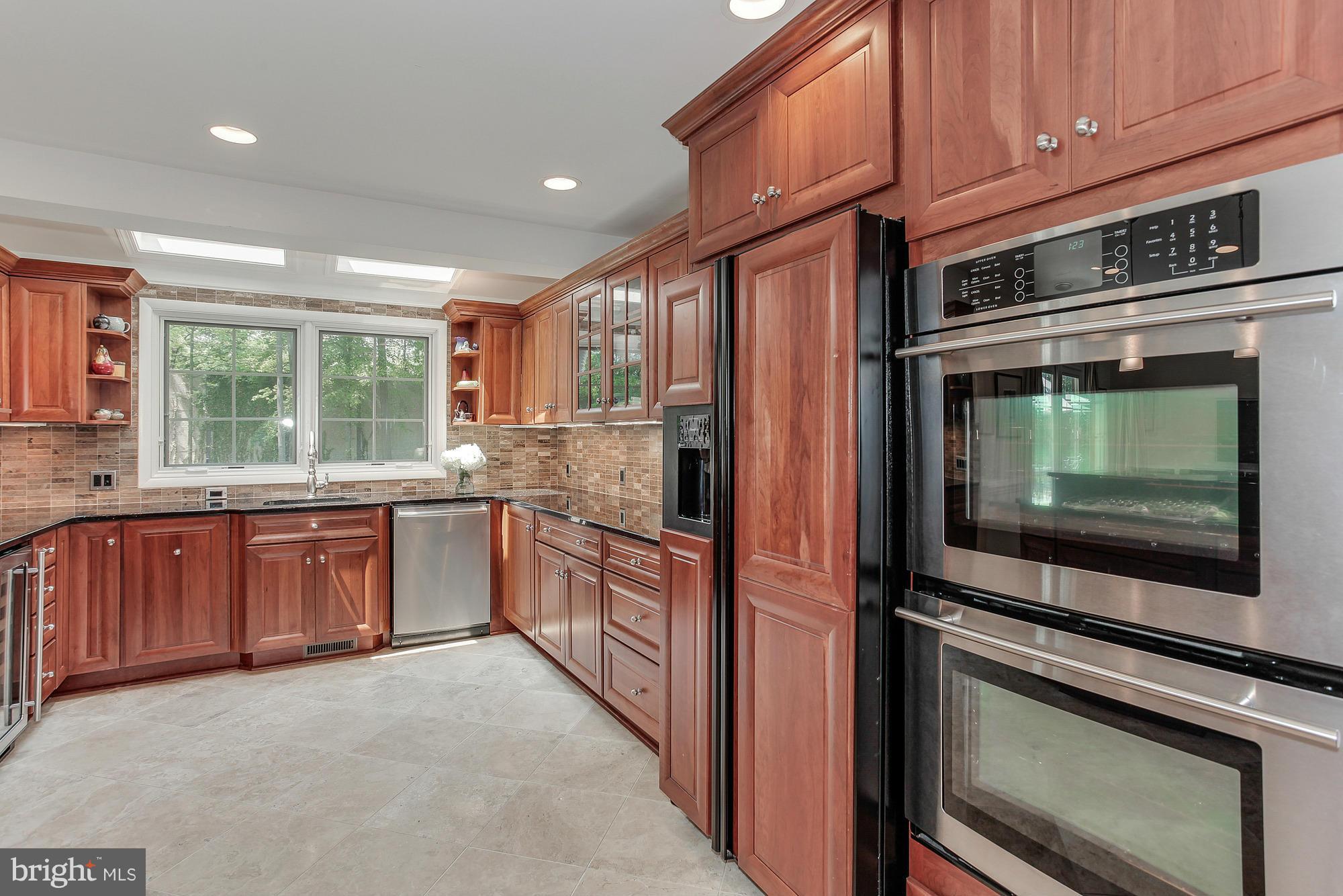 7413 Arrowood Road Bethesda, MD 20817 - Photo 9 of 30 Kitchen has Beautiful Travertine Floors