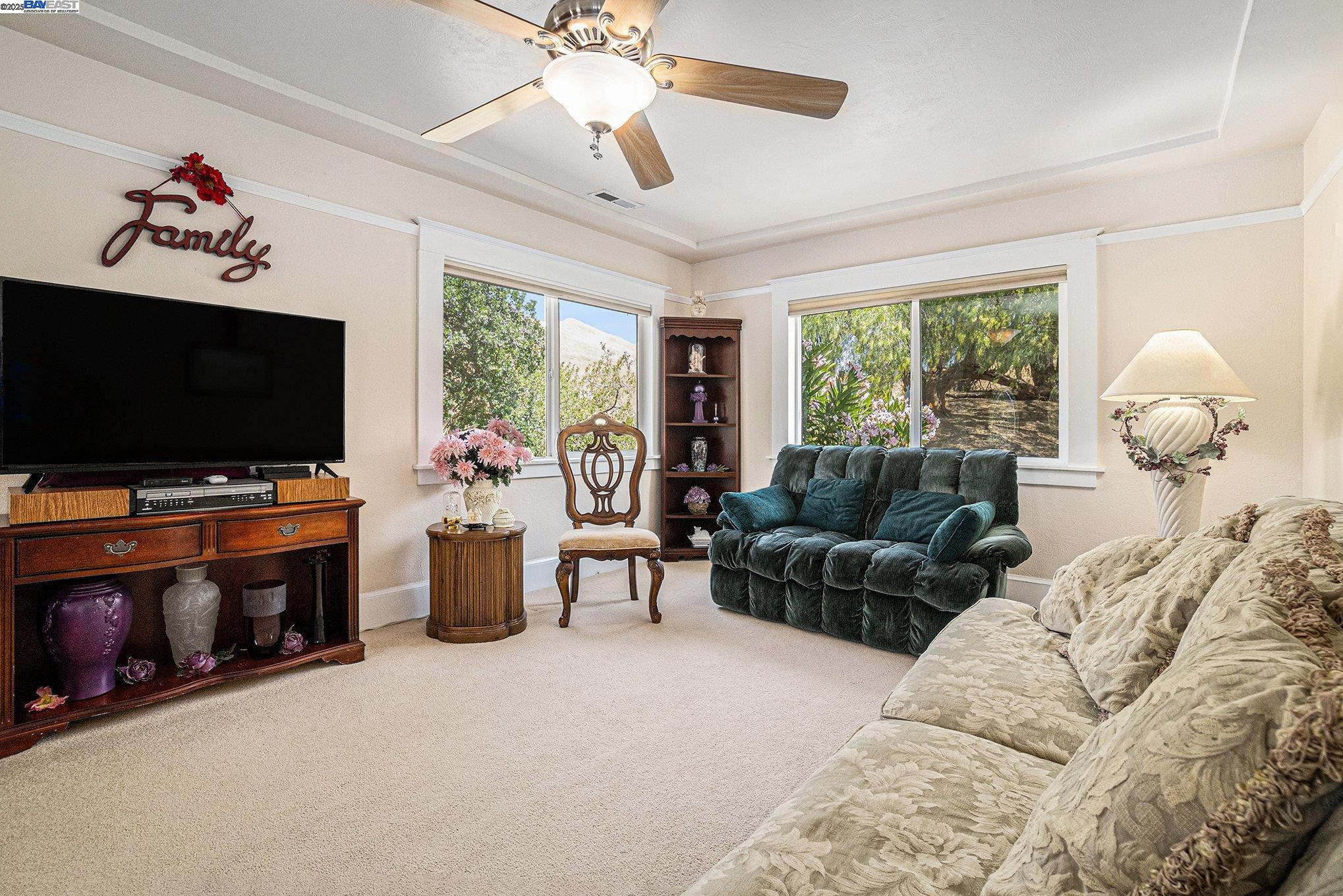 5799 Nortonville Road Pittsburg, CA 94565 - Photo 12 of 59 a living room with furniture and a flat screen tv