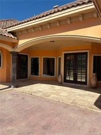 a front view of a house with a garage