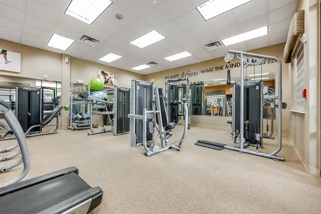 an aerial view of a house with swimming pool outdoor seating and yard