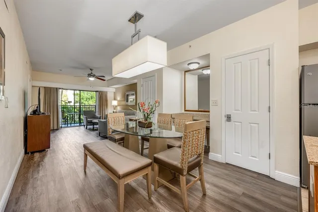 a view of a livingroom with furniture window and wooden floor