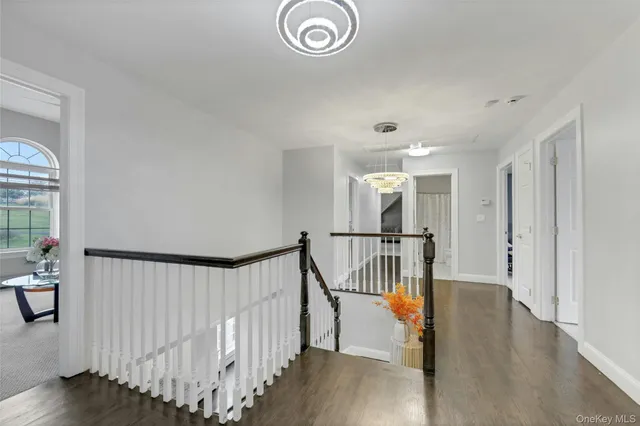 a view of entryway with wooden floor