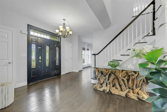wooden floor with an entryway
