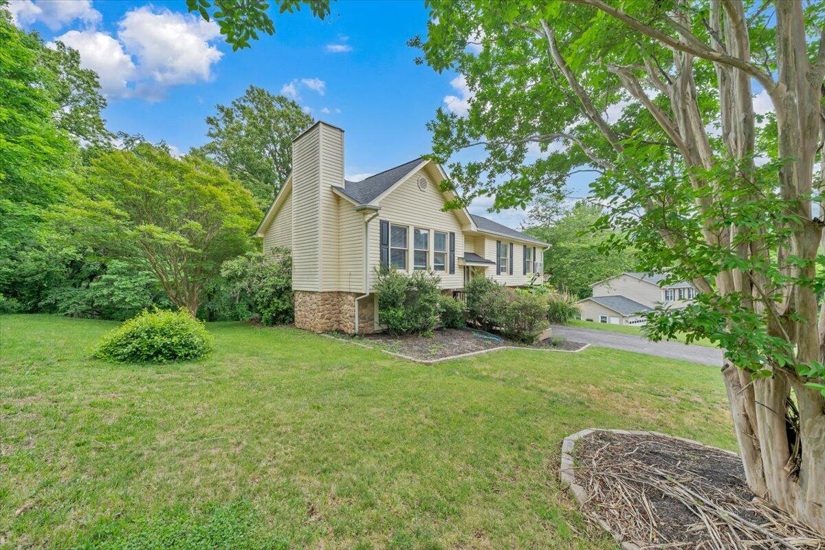 7851 Cedar Edge Road Roanoke, VA 24018 - Photo 41 of 44 a view of a house with a backyard
