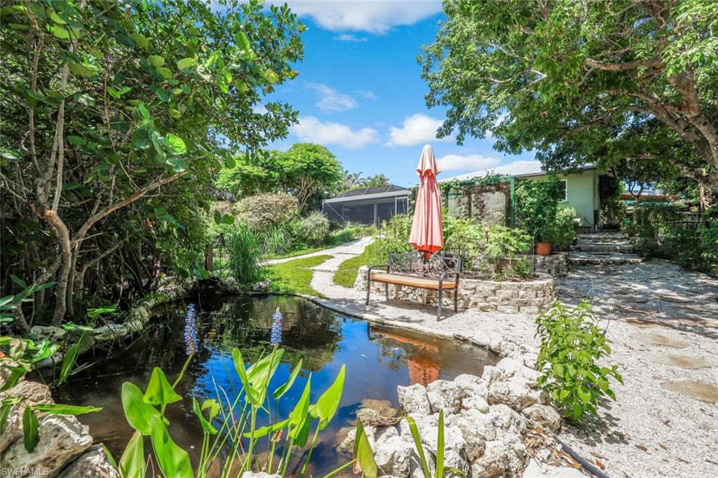 401 Panay Avenue Naples, FL 34113 - Photo 35 of 41 Terraced Rear Yard