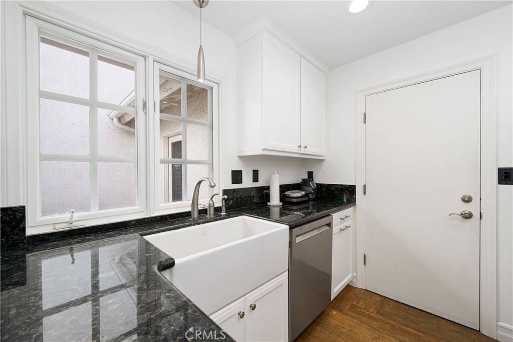20 Wintermist Irvine, CA 92614 - Photo 13 of 51 a kitchen with stainless steel appliances a sink a stove and a refrigerator
