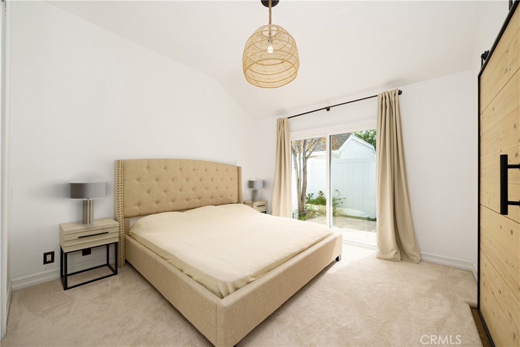 20 Wintermist Irvine, CA 92614 - Photo 15 of 51 a bedroom with a bed and a window