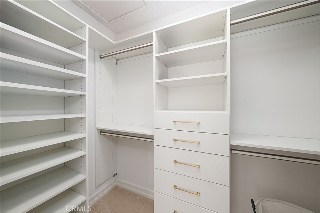 20 Wintermist Irvine, CA 92614 - Photo 17 of 51 a view of an empty walk in closet