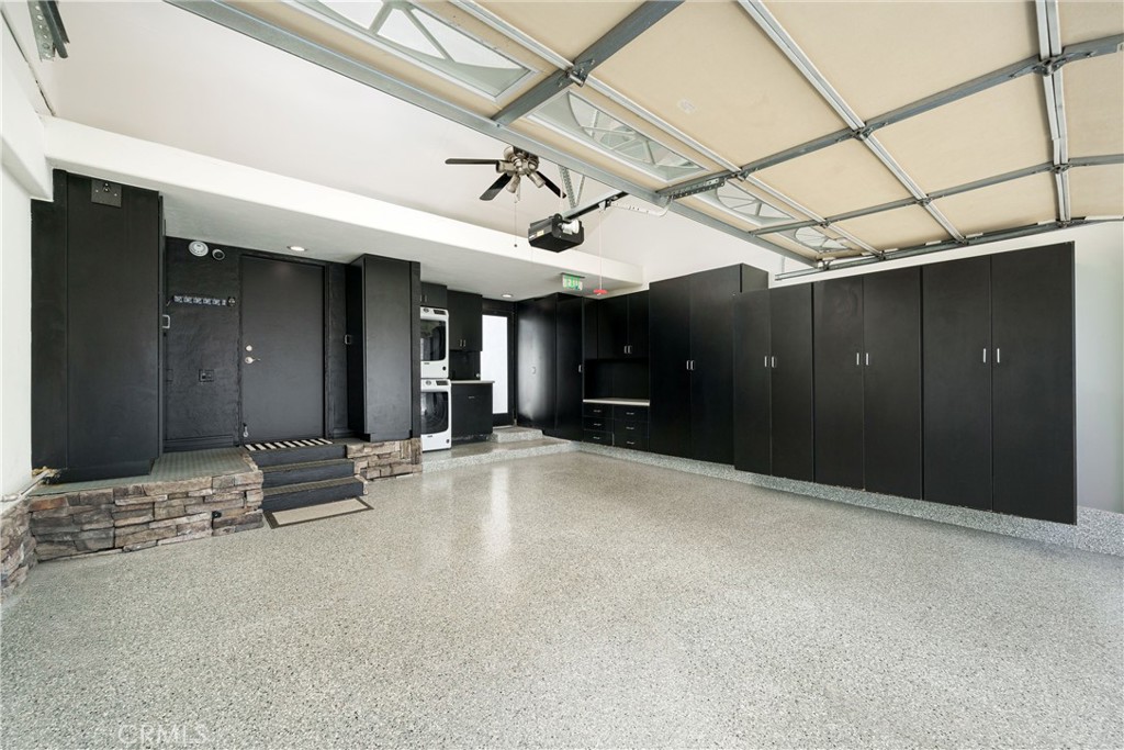 20 Wintermist Irvine, CA 92614 - Photo 46 of 51 a view of a hallway with a table and chairs