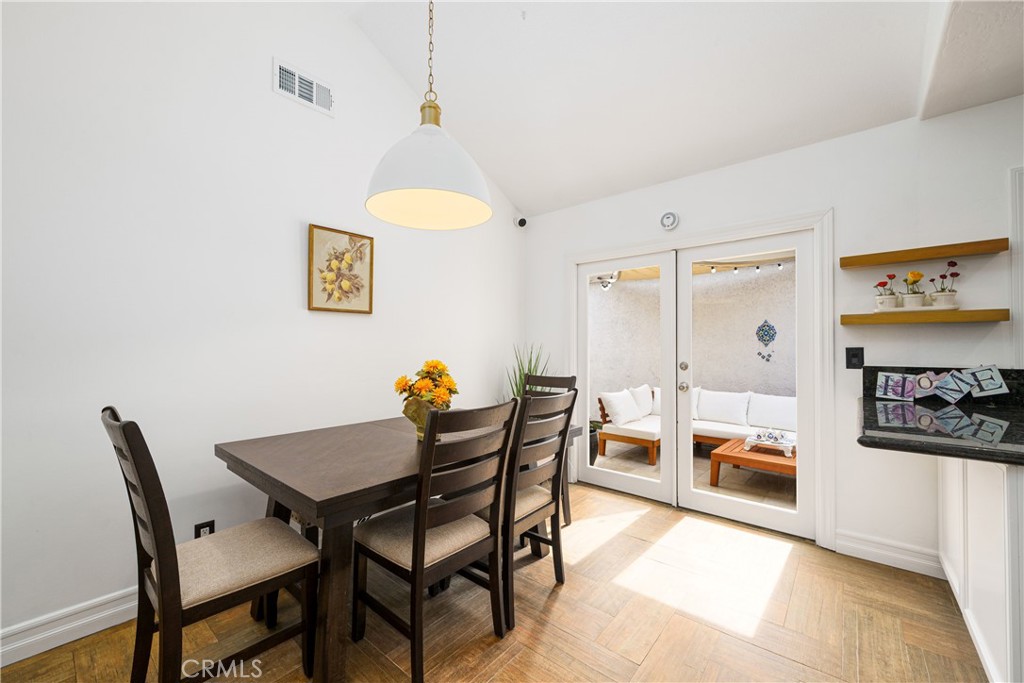 20 Wintermist Irvine, CA 92614 - Photo 7 of 51 a view of a dining room with furniture and a potted plant