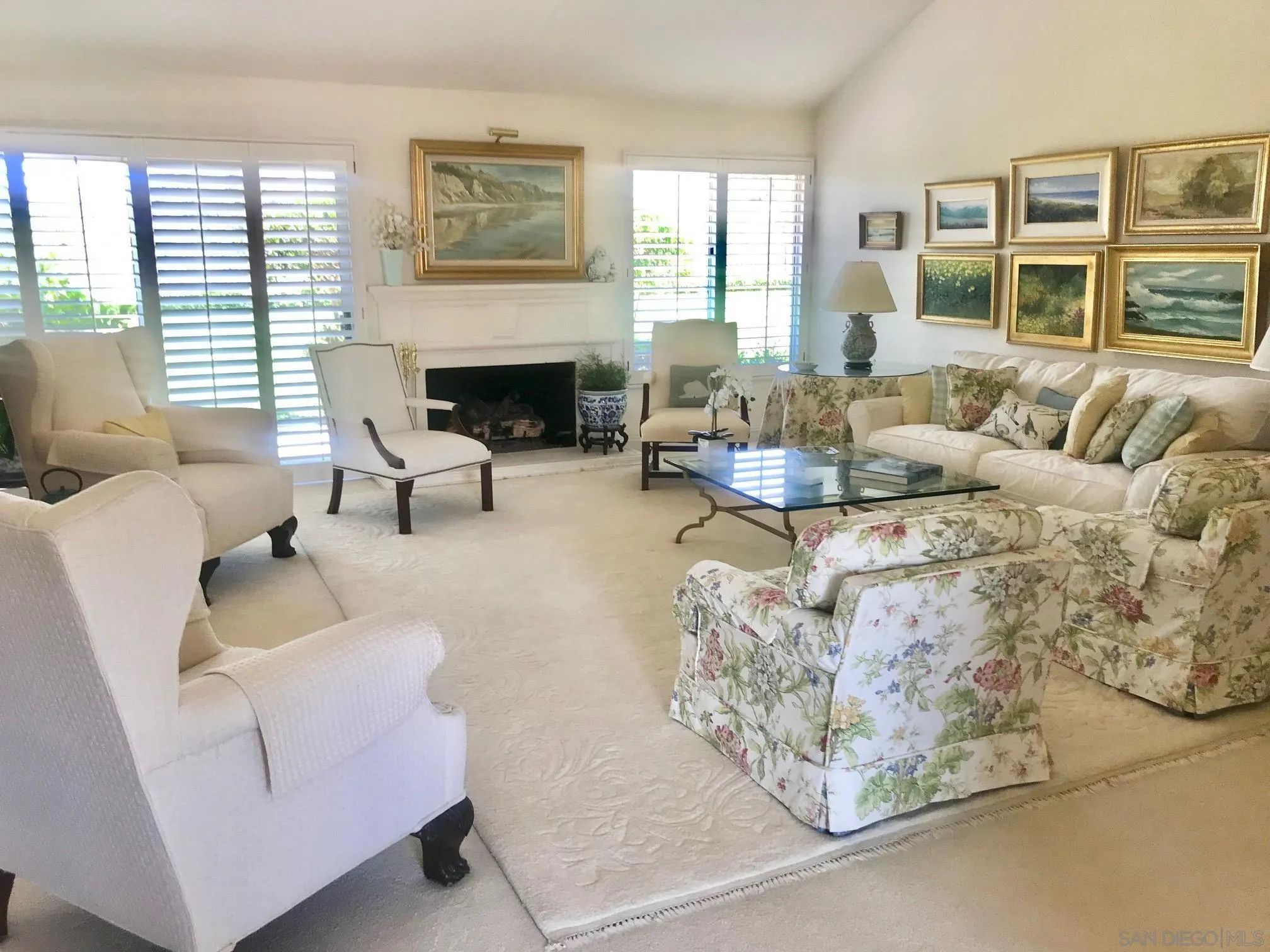 12650 Treehill Place Poway, CA 92064 - Photo 2 of 7 a living room with furniture large window and fireplace