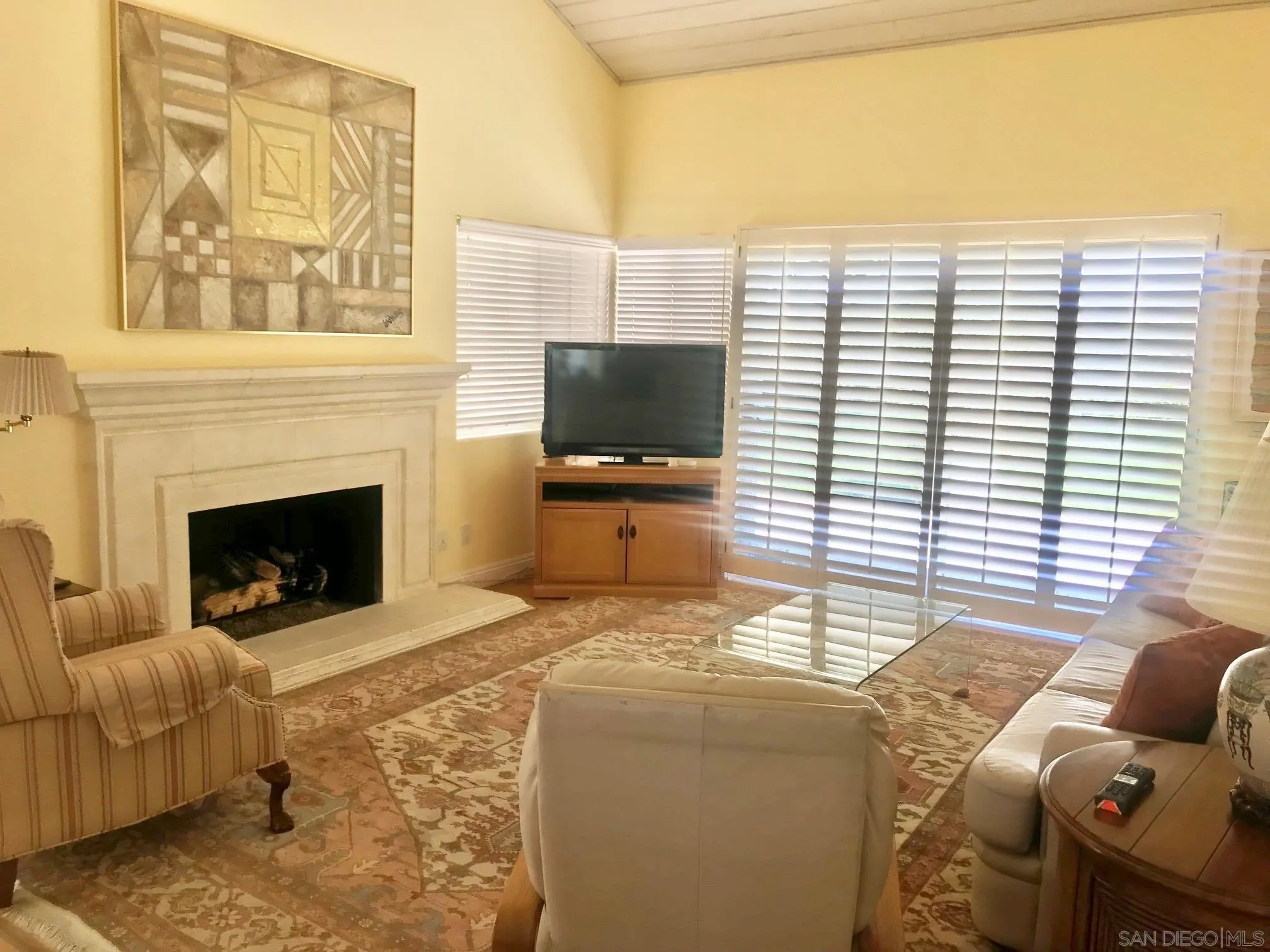 12650 Treehill Place Poway, CA 92064 - Photo 3 of 7 a living room with furniture and a fireplace