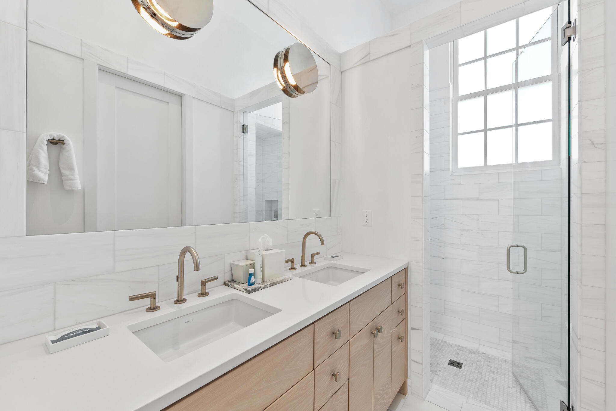 22 Sea Garden Street, Unit Z18 Inlet Beach, FL 32461 - Photo 14 of 44 a bathroom with double vanity sink a mirror and shower