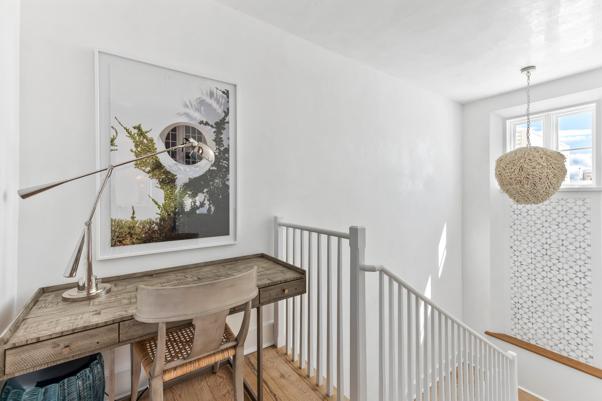 22 Sea Garden Street, Unit Z18 Inlet Beach, FL 32461 - Photo 16 of 44 a view of a hallway with paintings on the wall