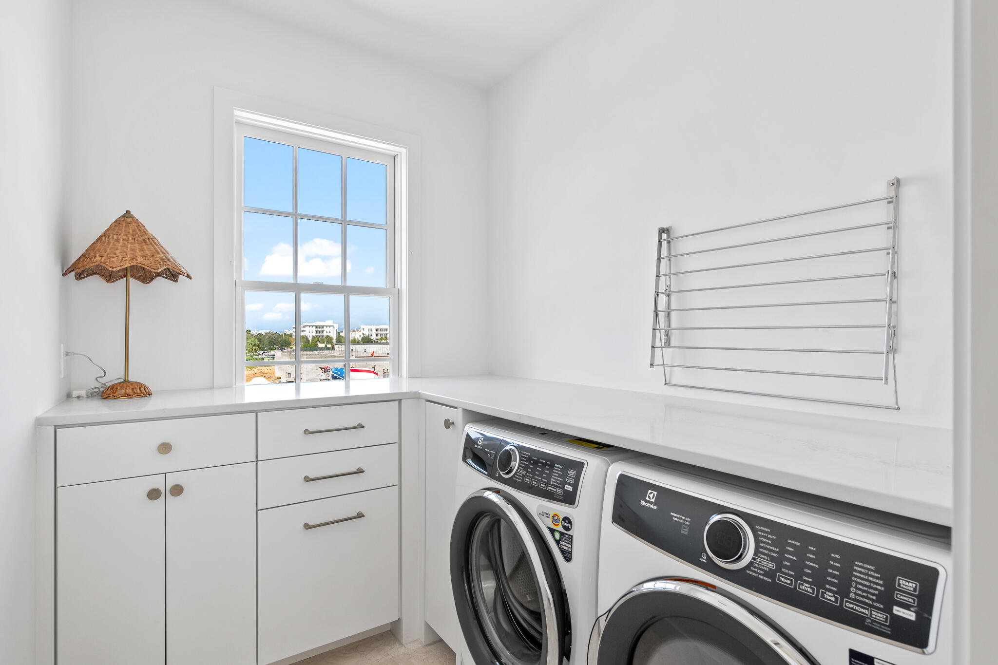 22 Sea Garden Street, Unit Z18 Inlet Beach, FL 32461 - Photo 17 of 44 a utility room with dryer and washer
