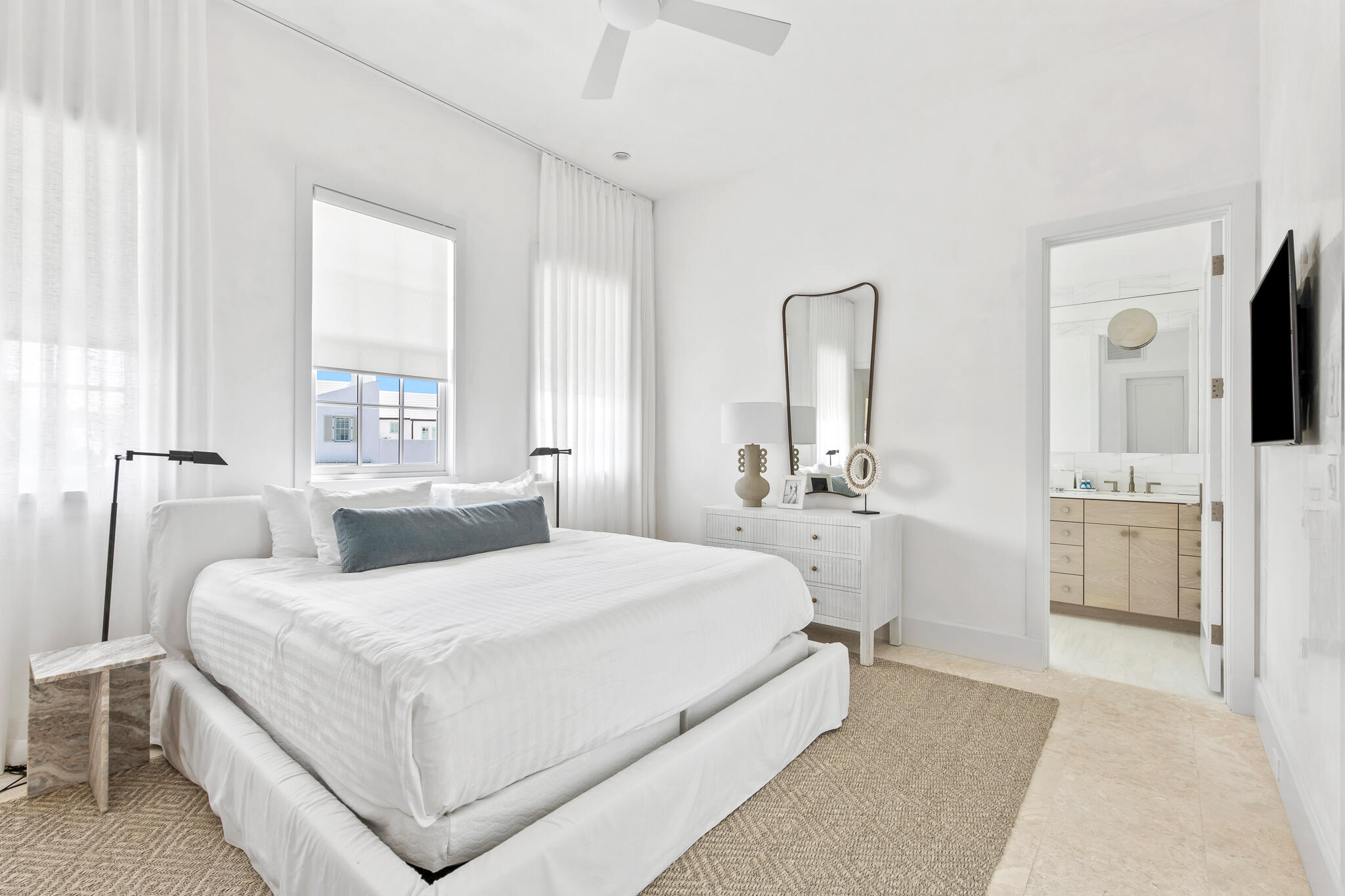 22 Sea Garden Street, Unit Z18 Inlet Beach, FL 32461 - Photo 29 of 44 a bedroom with a bed and a flat screen tv