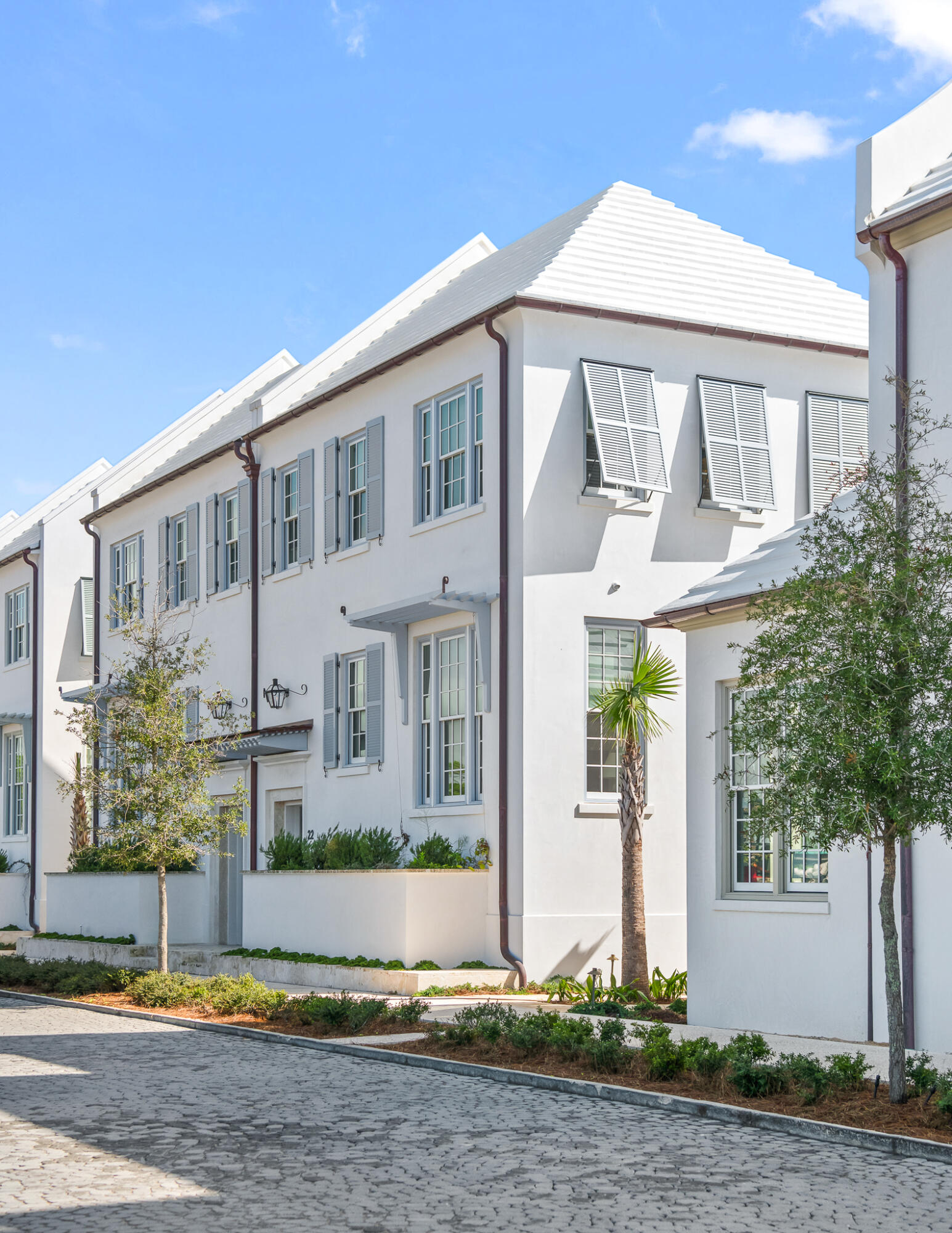 22 Sea Garden Street, Unit Z18 Inlet Beach, FL 32461 - Photo 3 of 44 a front view of a house with garden
