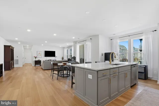 a kitchen with a sink and stove