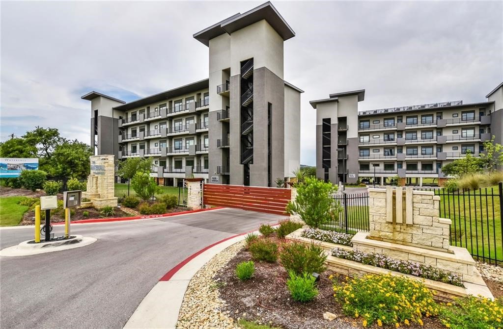 5921 Hiline Road, Unit 1302 Austin, TX 78734 - Photo 1 of 1 a front view of a building with street view