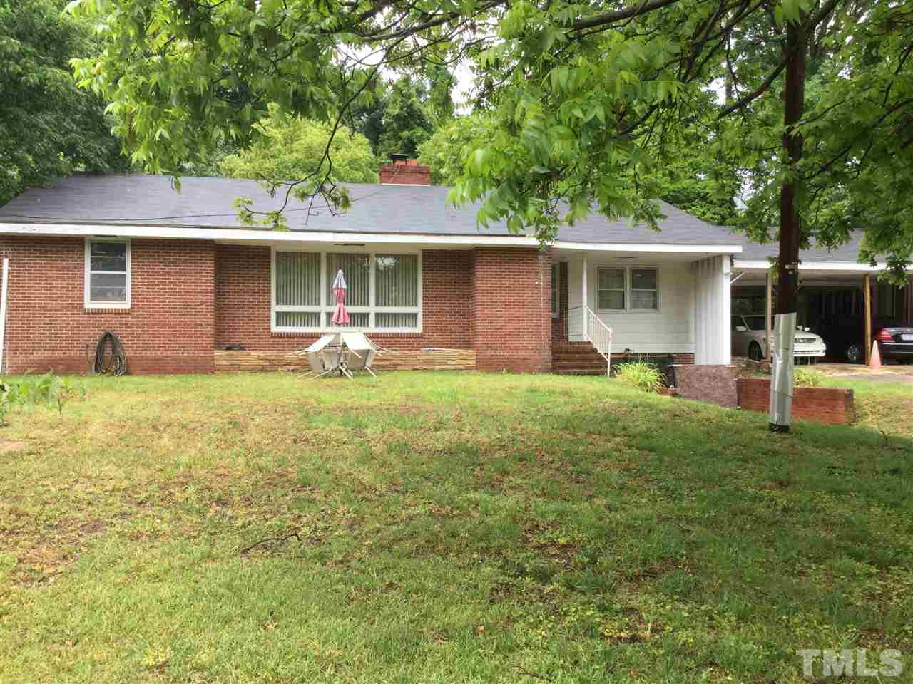 610 Sunnybrook Road Raleigh, NC 27610 - Photo 1 of 12 a front view of house with yard and green space