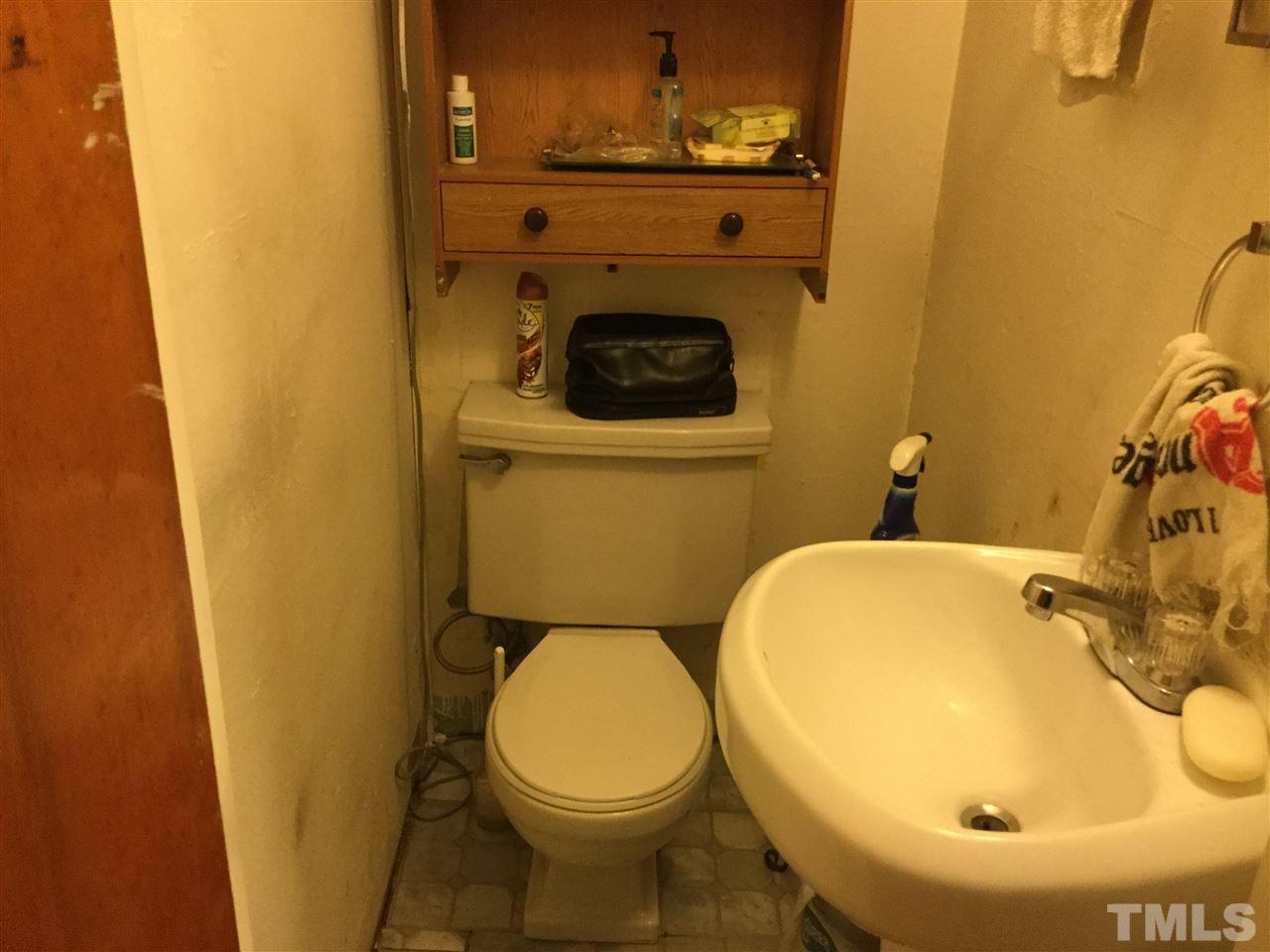 610 Sunnybrook Road Raleigh, NC 27610 - Photo 8 of 12 a bathroom with a sink and toilet