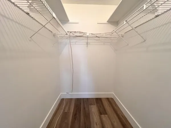 a view of a room with racks on the wall