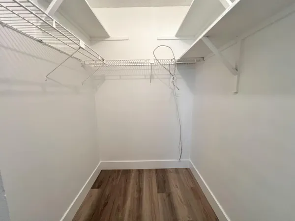 a view of a room with racks on the wall