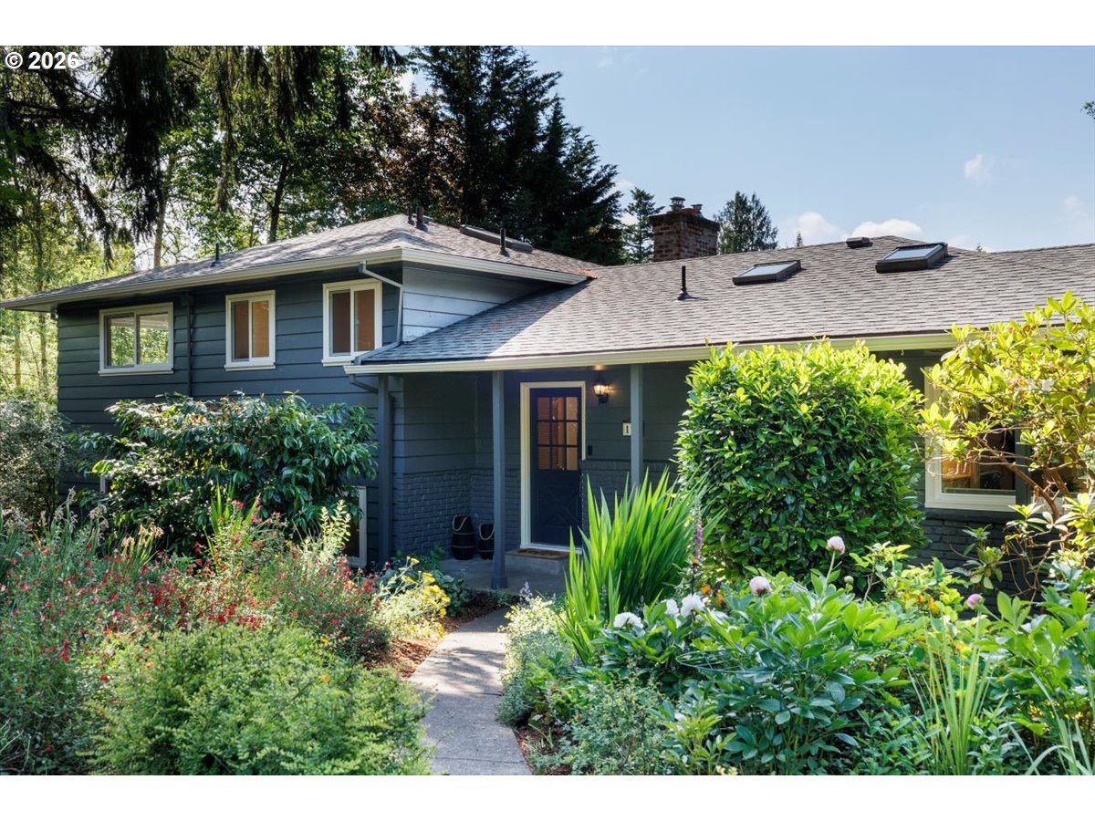 175 Northwest 95th Avenue Portland, OR 97229 - Photo 3 of 46 a front view of a house with garden