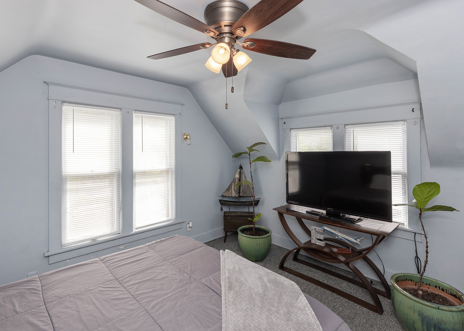 1839 15th Street Moline, IL 61265 - Photo 25 of 32 a living room with furniture and a flat screen tv